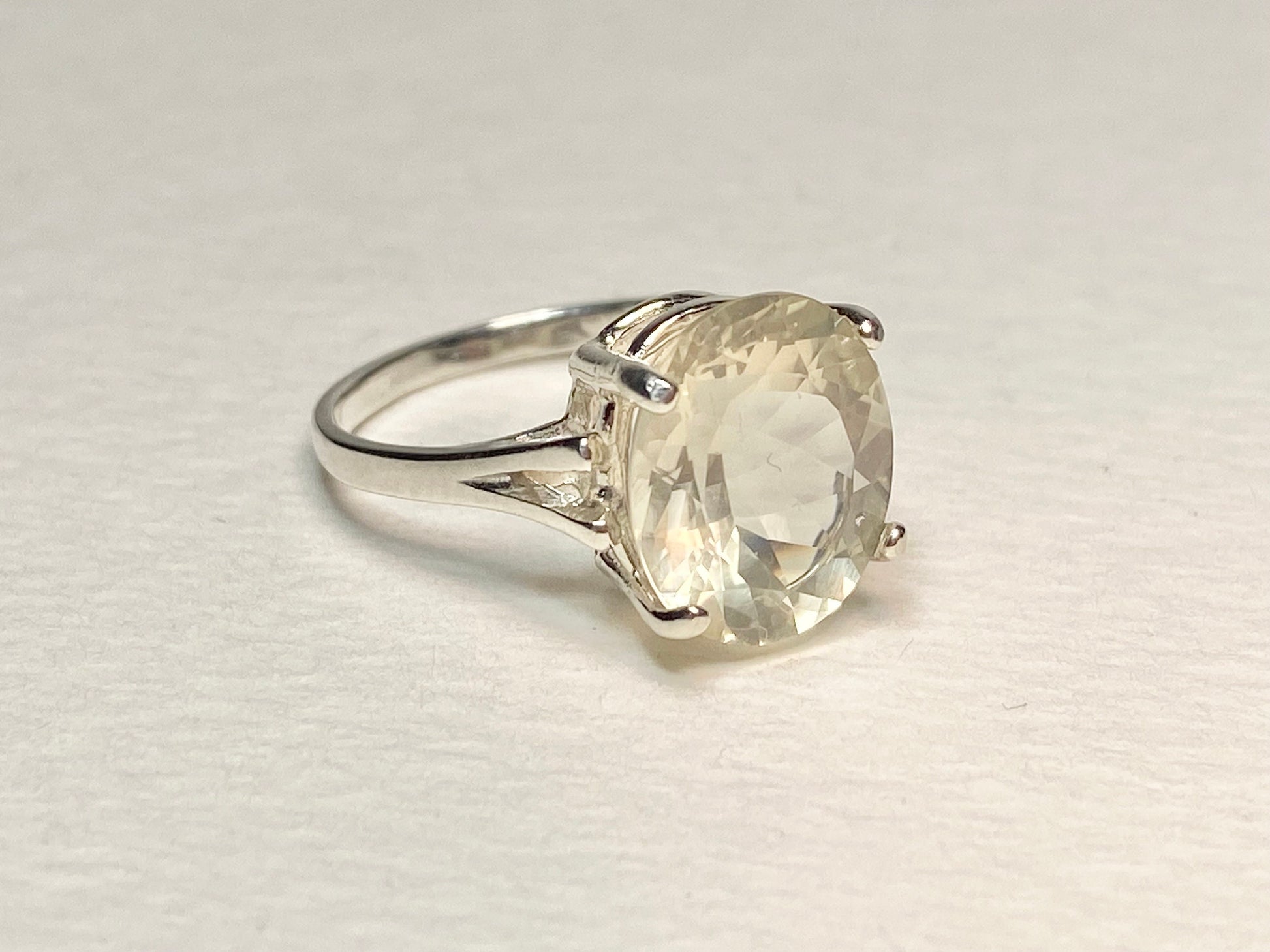 Sterling silver ring with a 12x10mm oval Oregon Sunstone.