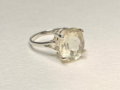 Sterling silver ring with a 12x10mm oval Oregon Sunstone.