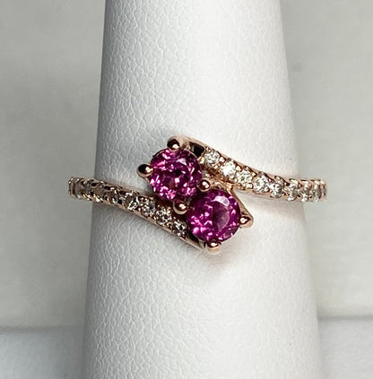 14k rose gold toi et moi ring with two rhodolite garnets and diamonds.