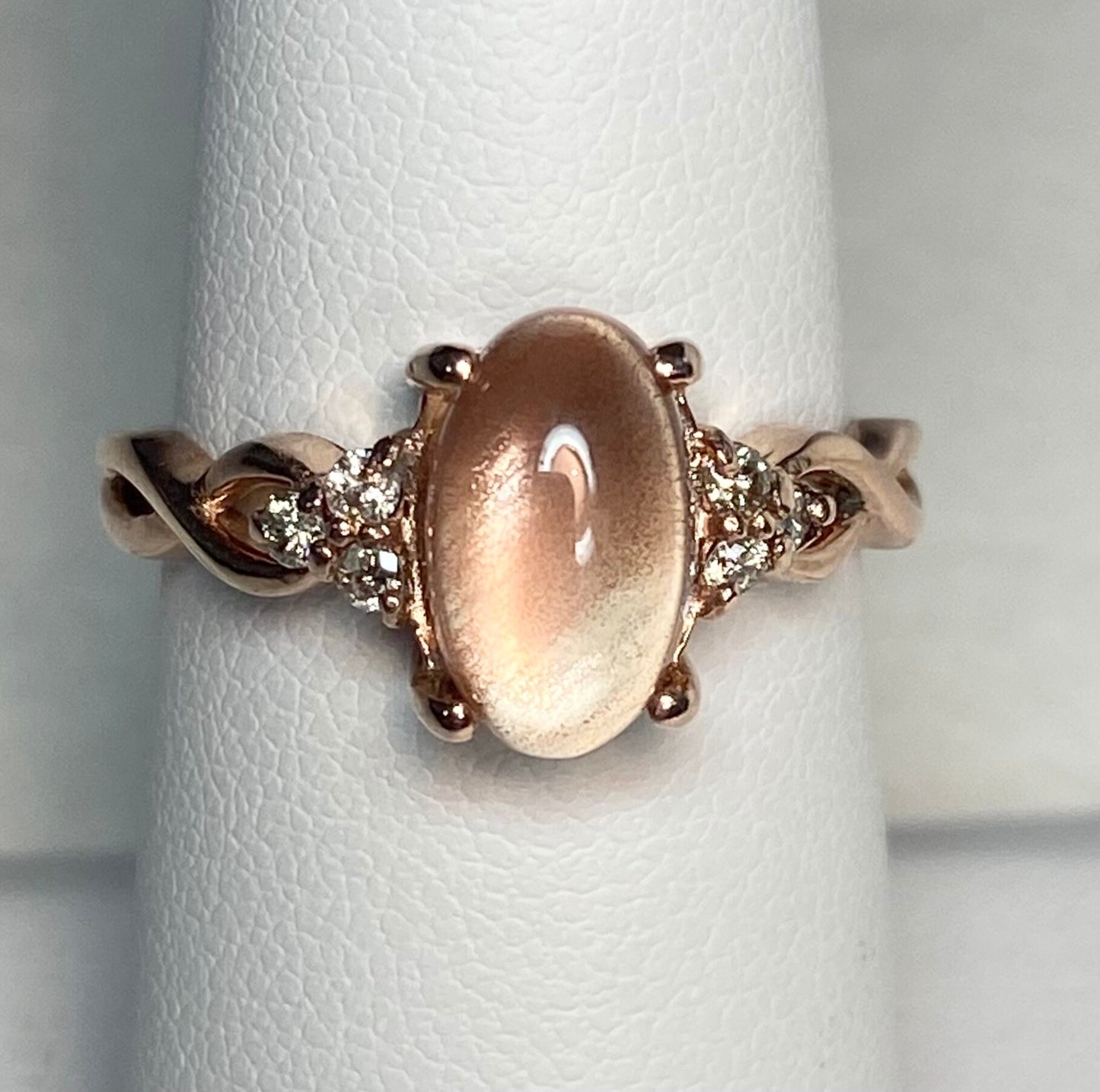 Oregon Sunstone and diamond ring in solid 10k rose gold.