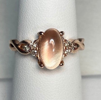Oregon Sunstone and diamond ring in solid 10k rose gold.
