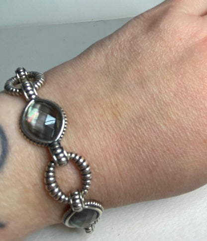 Lagos sterling silver bracelet with Tahitian black lipped oyster mother of pearl and quartz doublet.