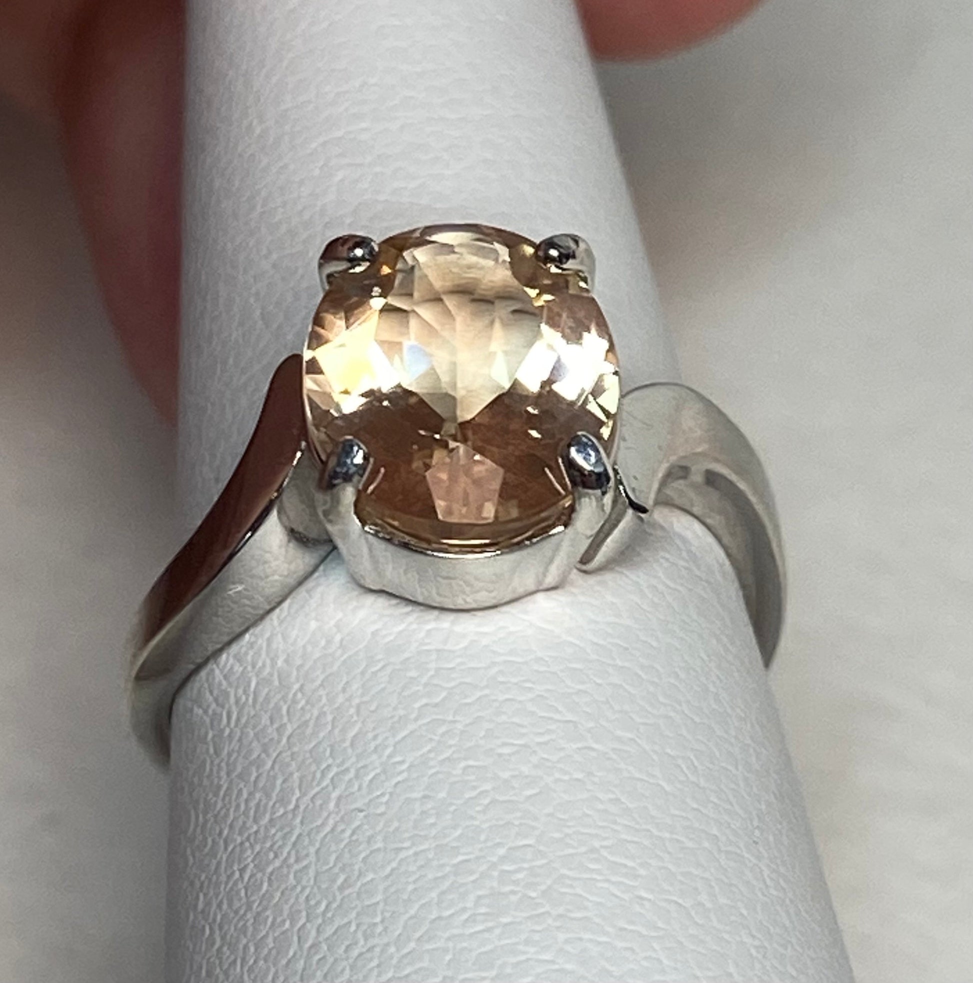 Oval light champagne Oregon sunstone ring in sterling silver.