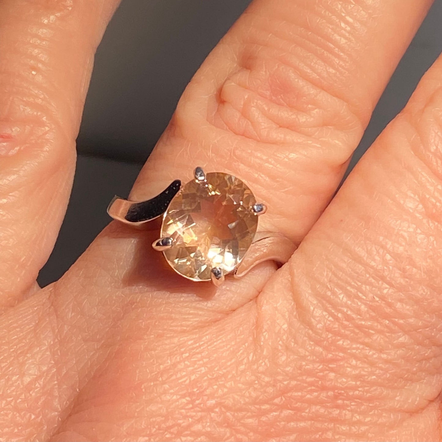 Oval champagne Oregon sunstone ring in sterling silver.