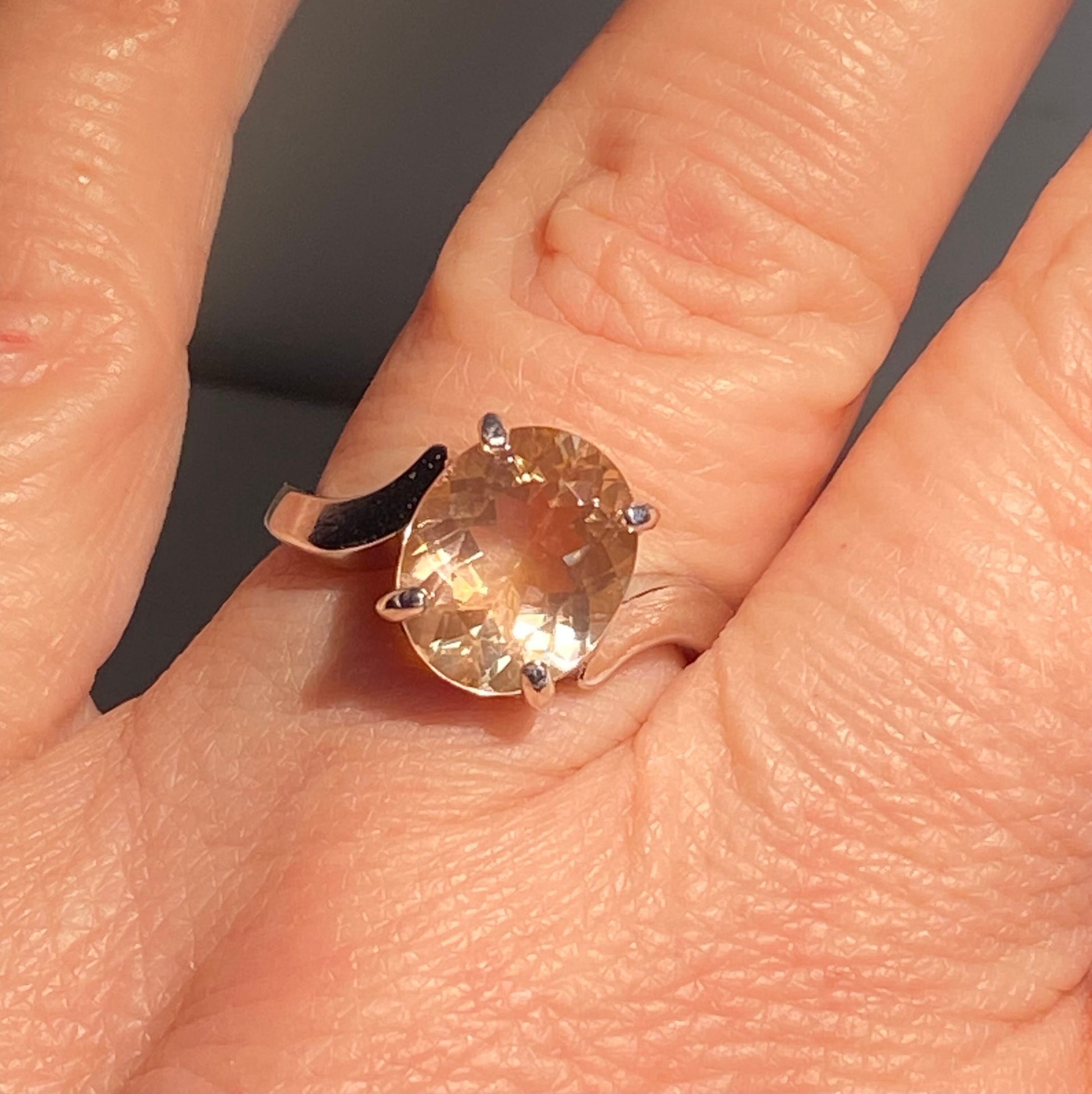 Oval champagne Oregon sunstone ring in sterling silver.