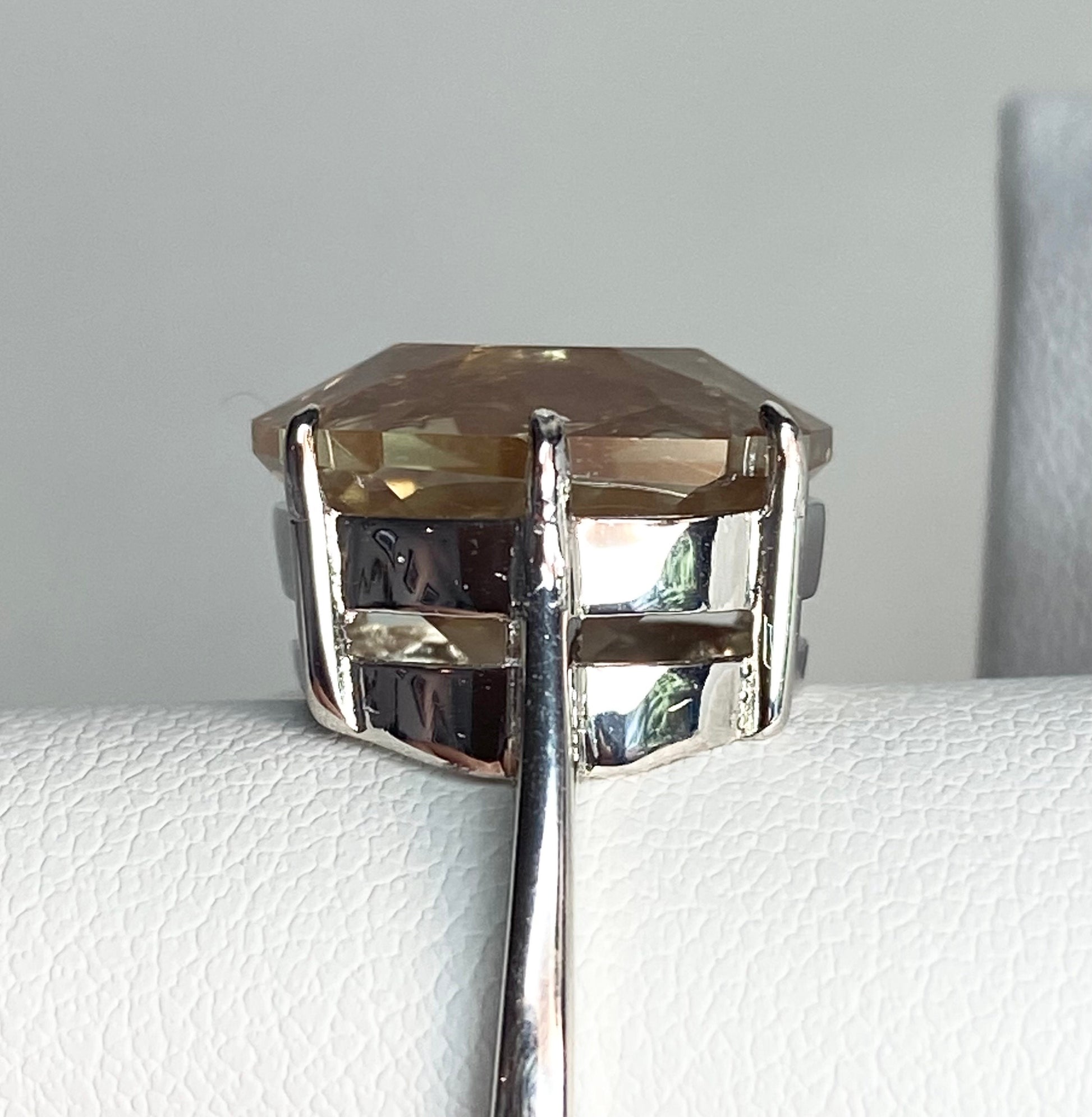 Sterling silver ring with a large, fancy-cut Oregon sunstone.