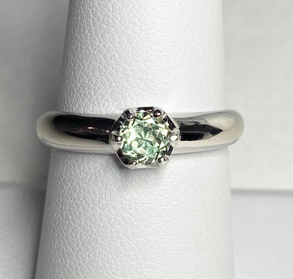 Sterling silver ring with a color-changing chrysoberyl gemstone in a solitaire setting.
