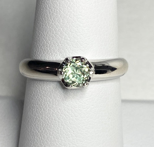 Sterling silver ring with a color-changing chrysoberyl gemstone in a solitaire setting.