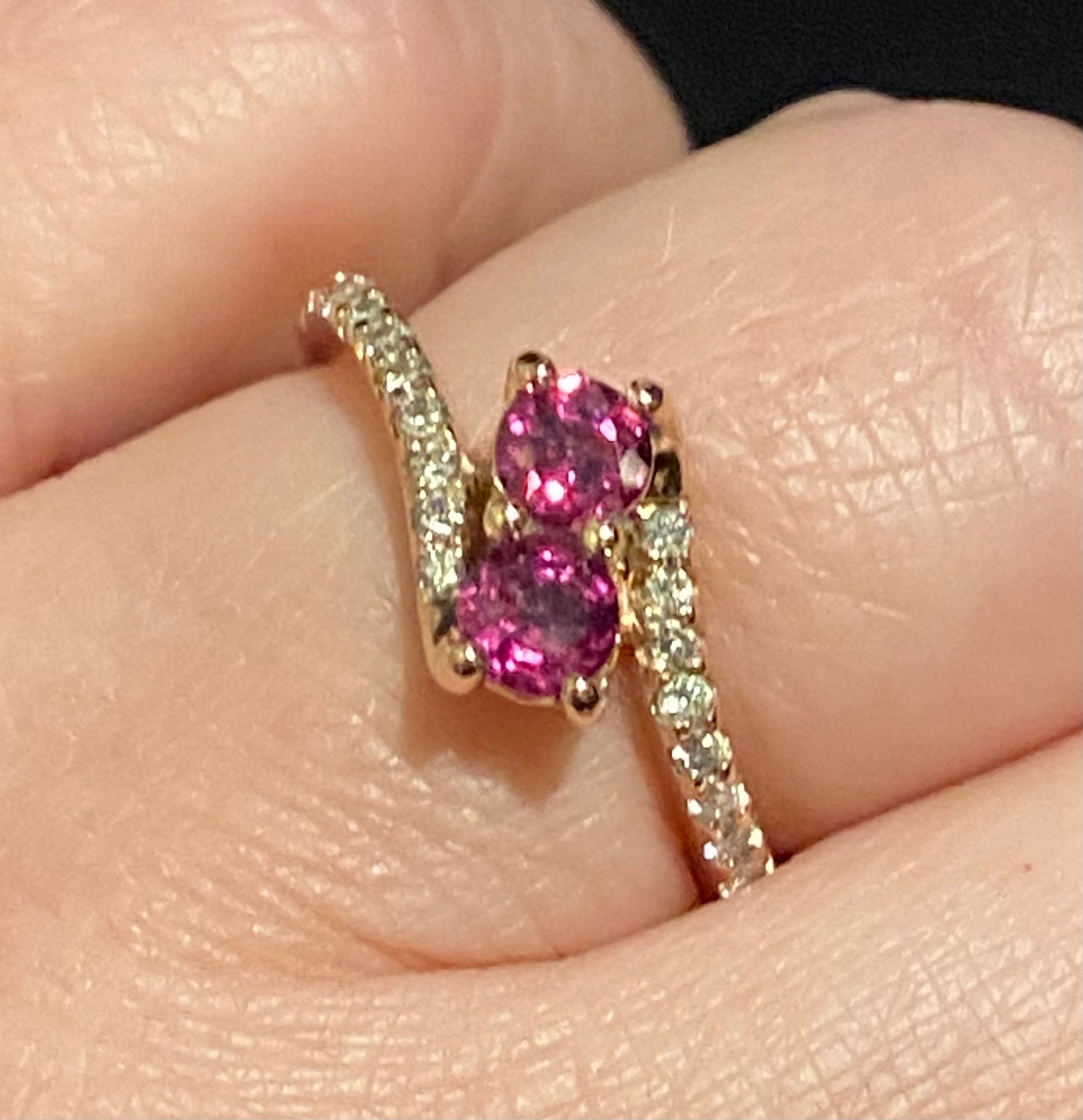14k rose gold toi et moi ring with two rhodolite garnets and diamonds.