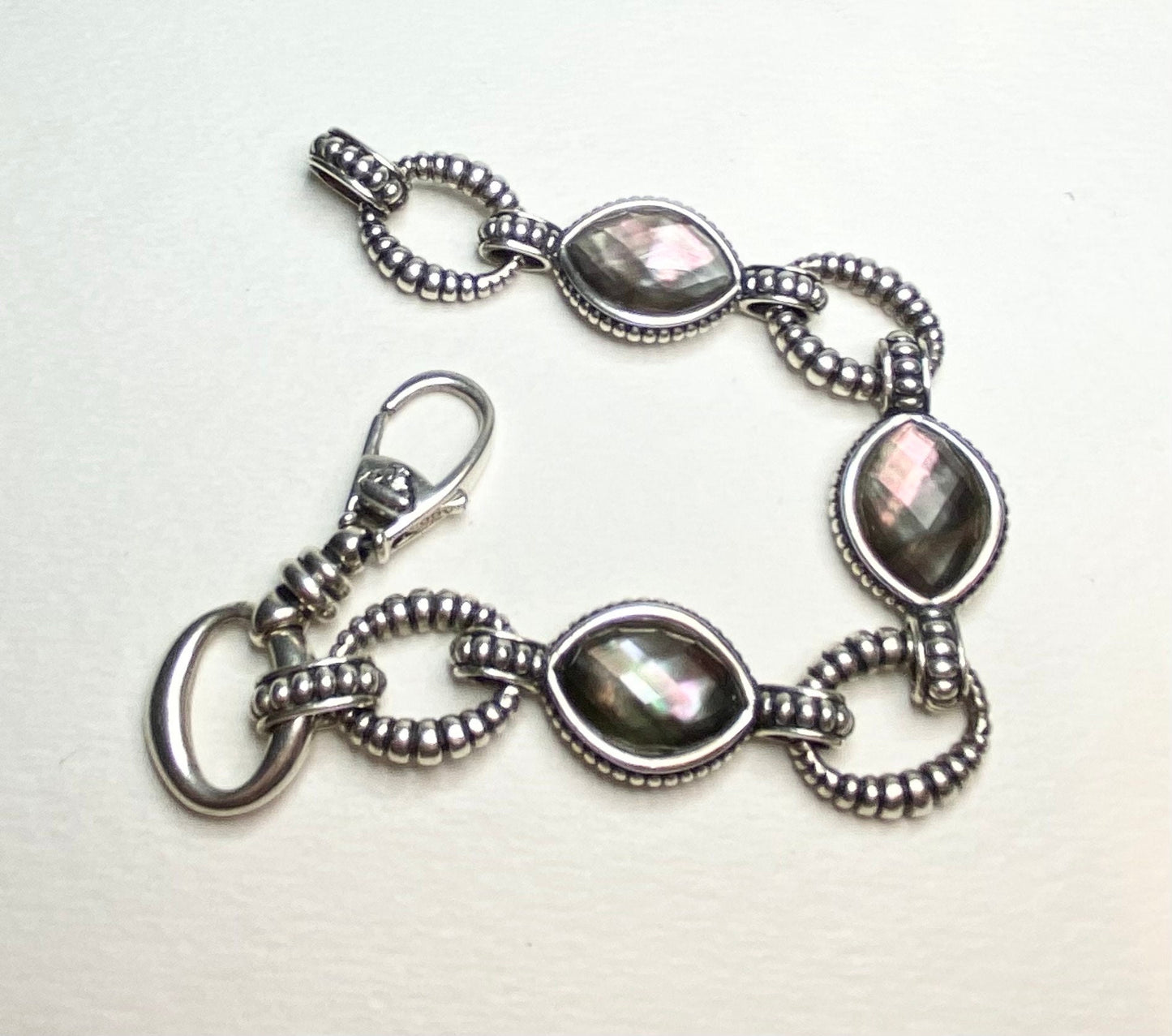 Lagos sterling silver bracelet with Tahitian mother of pearl and quartz doublet stones.