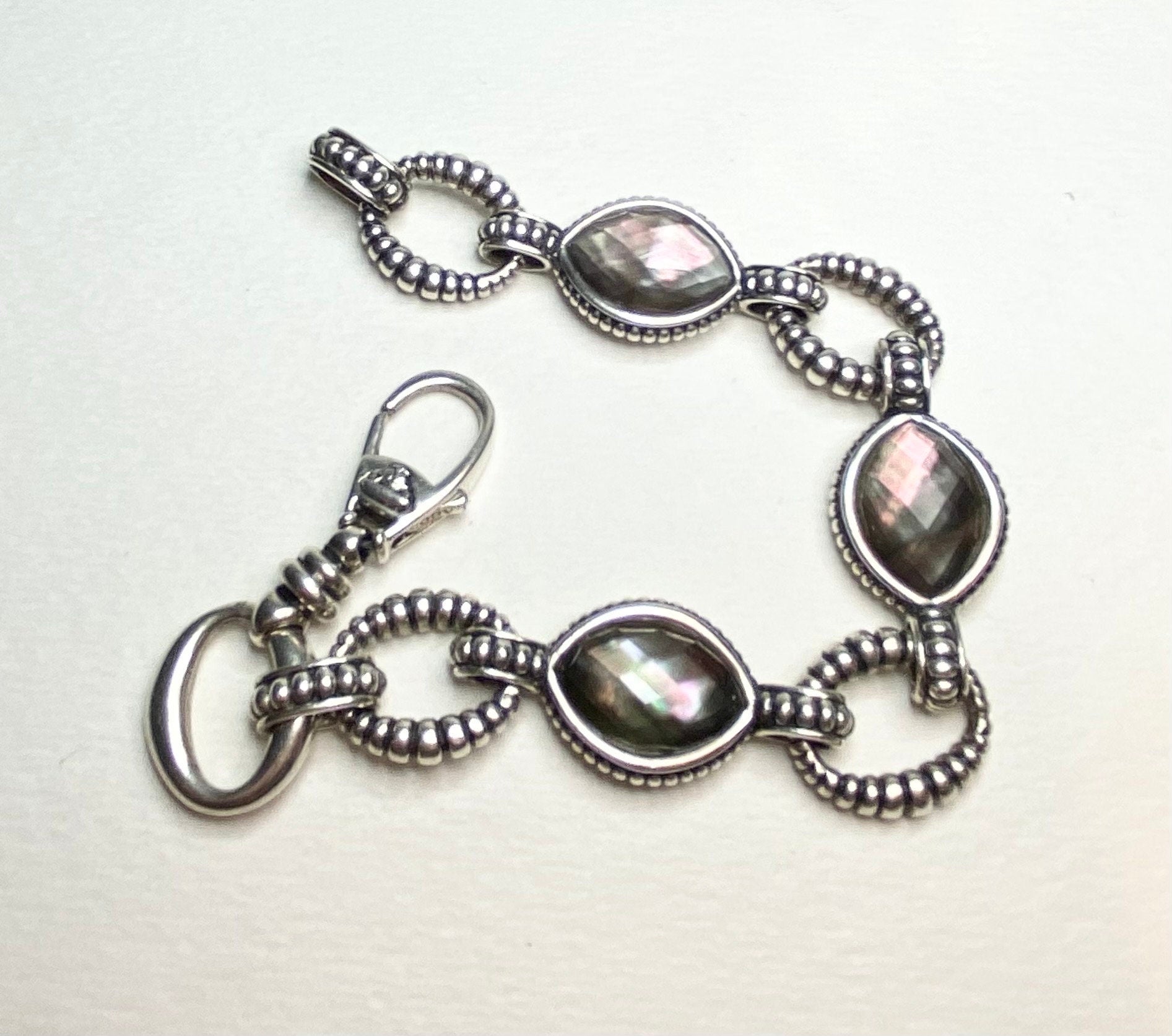 Lagos sterling silver bracelet with Tahitian mother of pearl and quartz doublet stones.