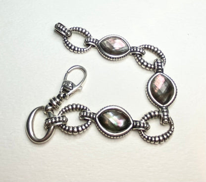 Lagos sterling silver bracelet with Tahitian mother of pearl and quartz doublet stones.