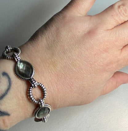 Lagos sterling silver bracelet with Tahitian black lipped oyster mother of pearl and quartz doublet.