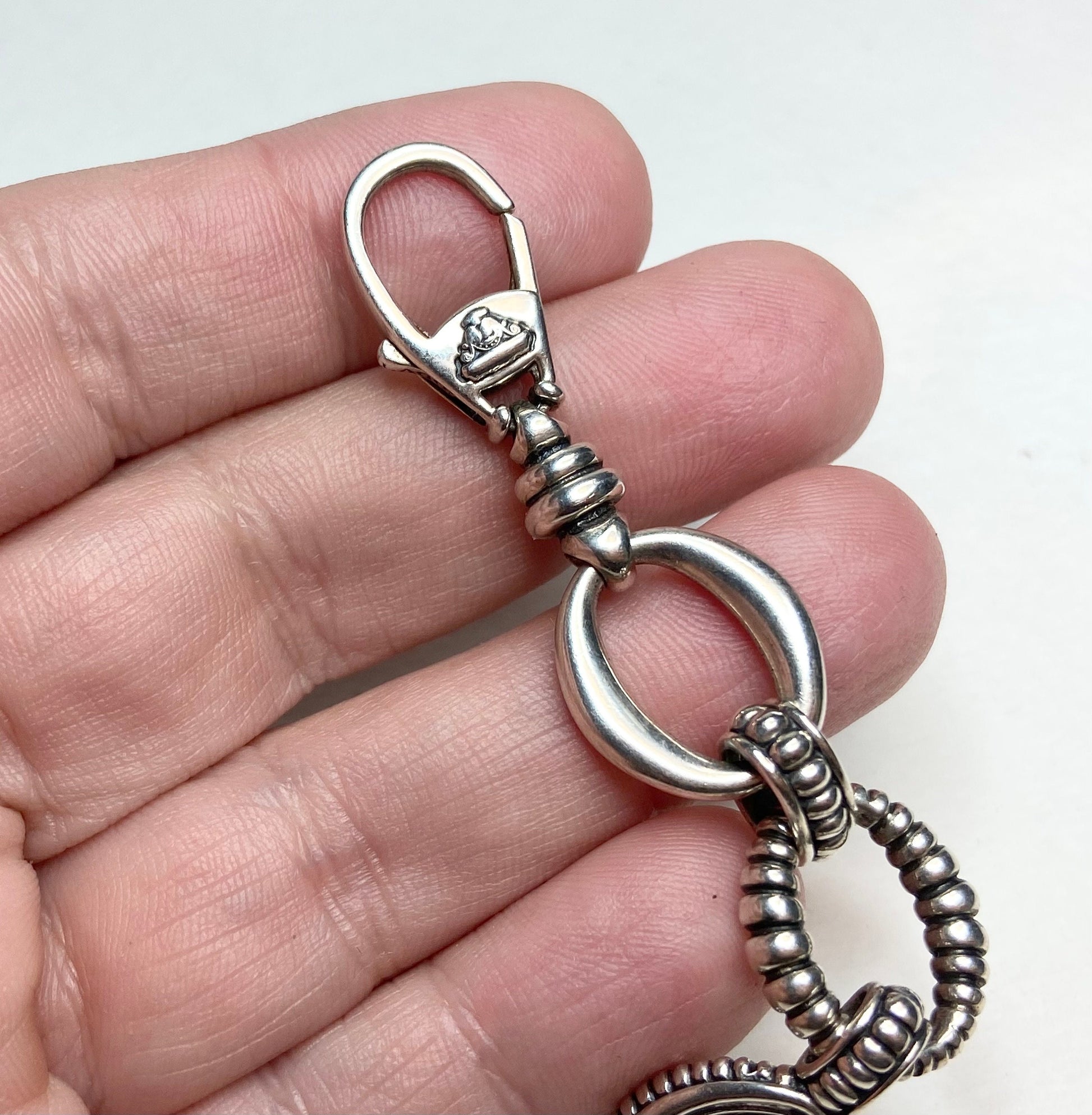 Sterling silver Lagos bracelet with black-lipped oyster mother of pearl and quartz doublet.