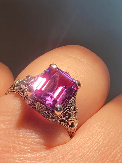 Art Deco sterling silver ring with a rectangular synthetic color-change sapphire.