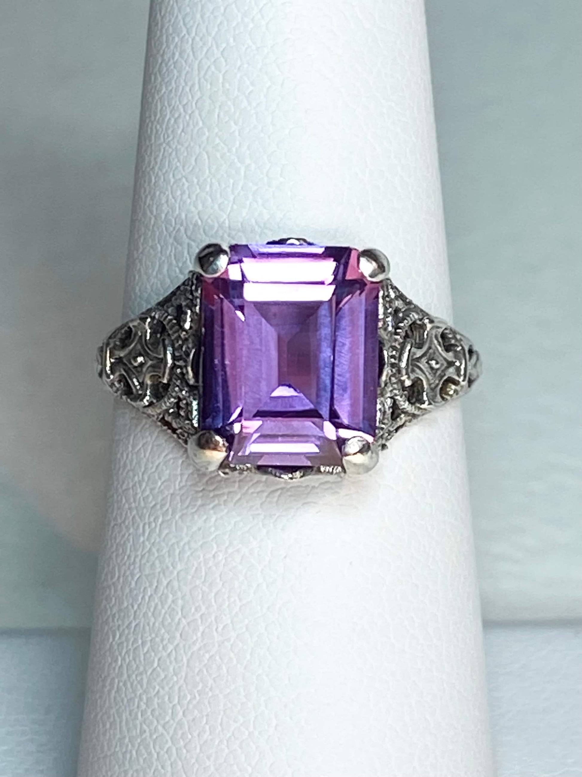 Art Deco sterling silver ring with a rectangular color-change sapphire.