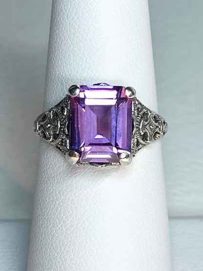 Art Deco sterling silver ring with a rectangular color-change sapphire.