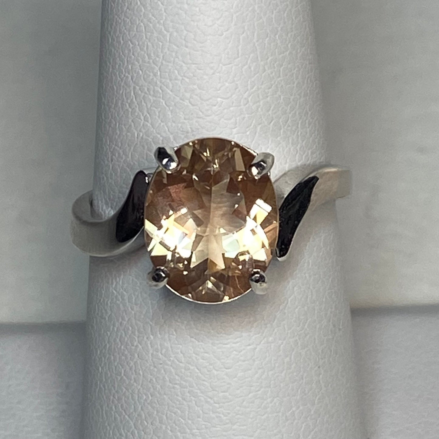 Oval champagne Oregon sunstone ring in sterling silver.