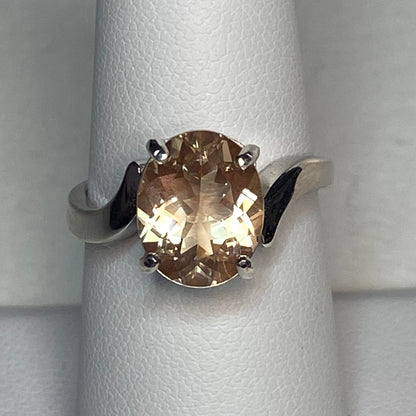 Oval champagne Oregon sunstone ring in sterling silver.
