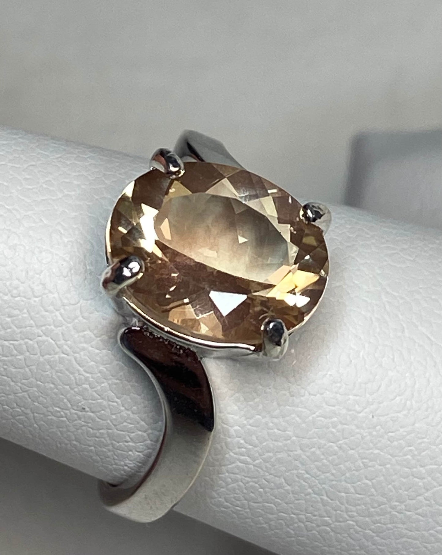 Oval light champagne Oregon sunstone ring in sterling silver.