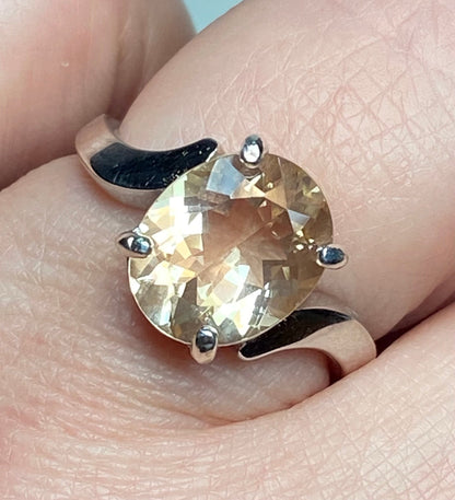 Oval champagne Oregon sunstone ring in sterling silver.