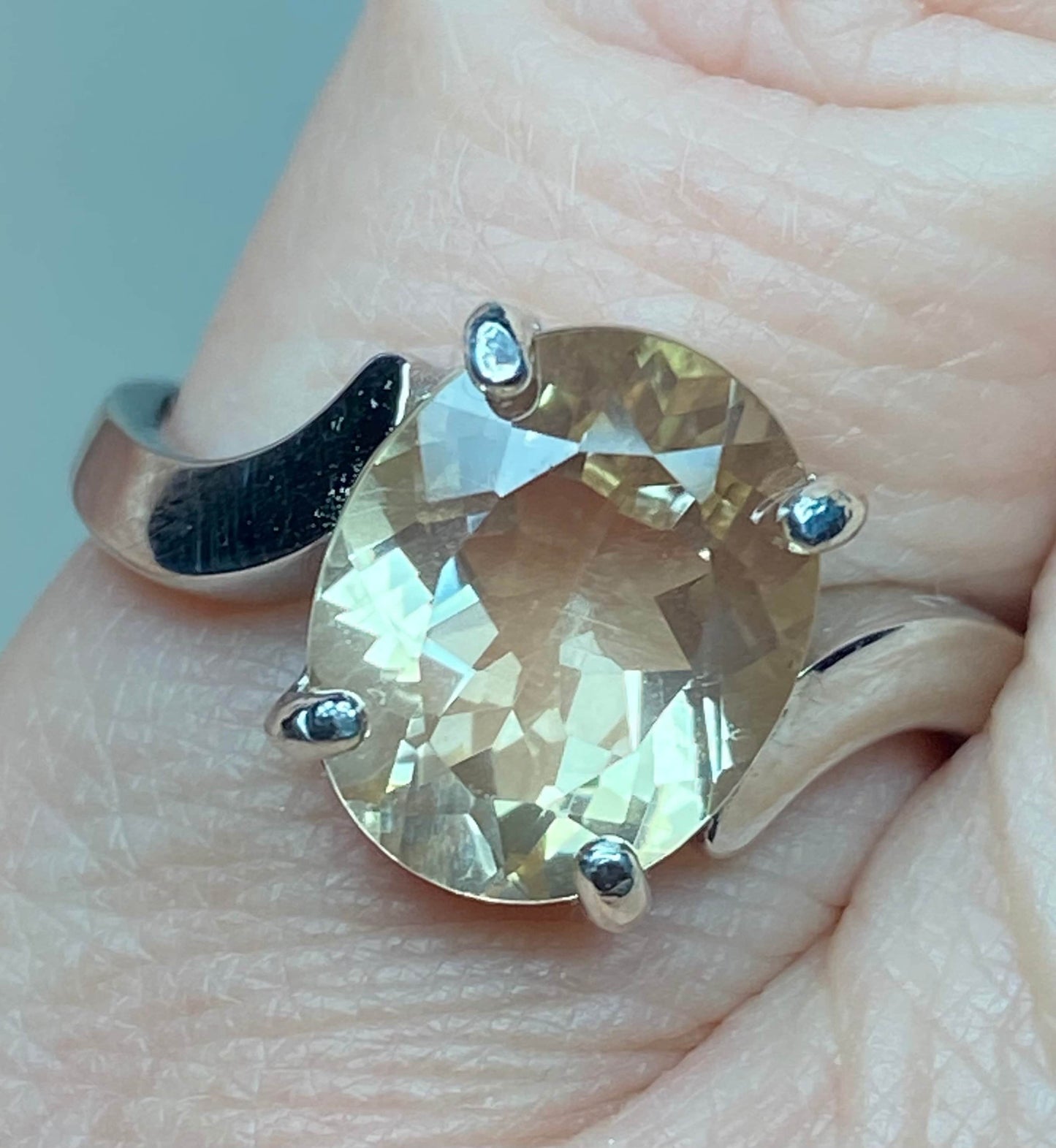 Oval champagne Oregon sunstone ring in sterling silver.