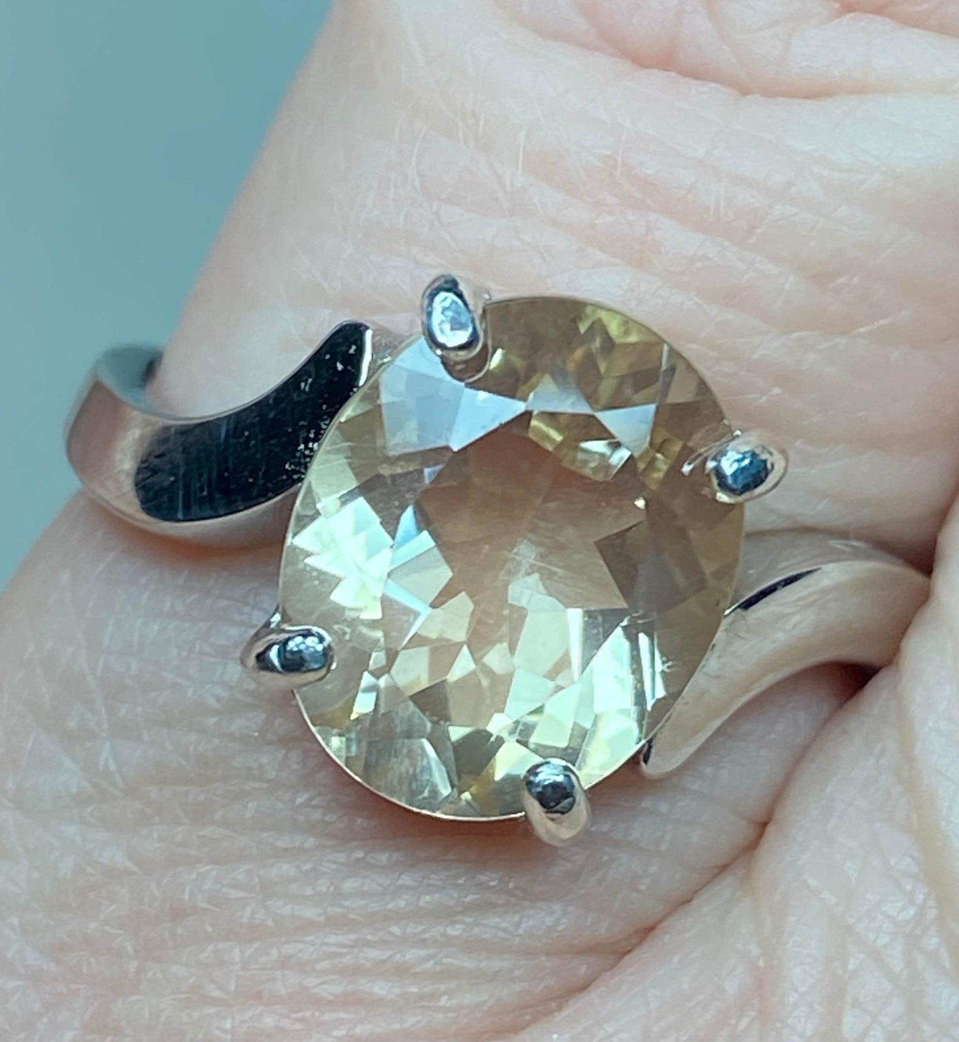 Oval champagne Oregon sunstone ring in sterling silver.