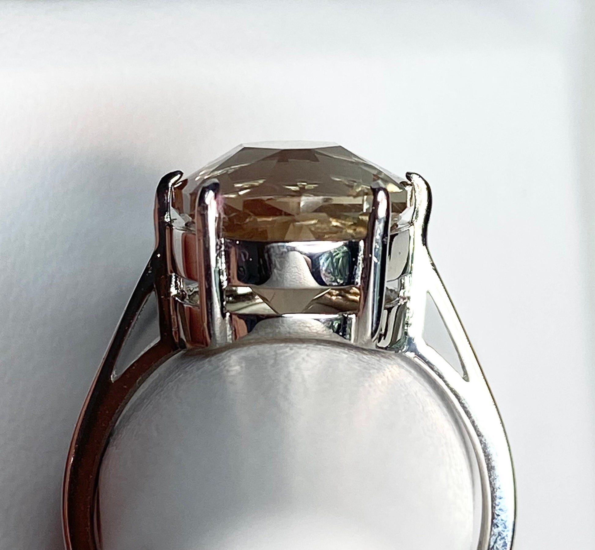 A large, fancy-cut Oregon sunstone ring in a sterling silver setting.