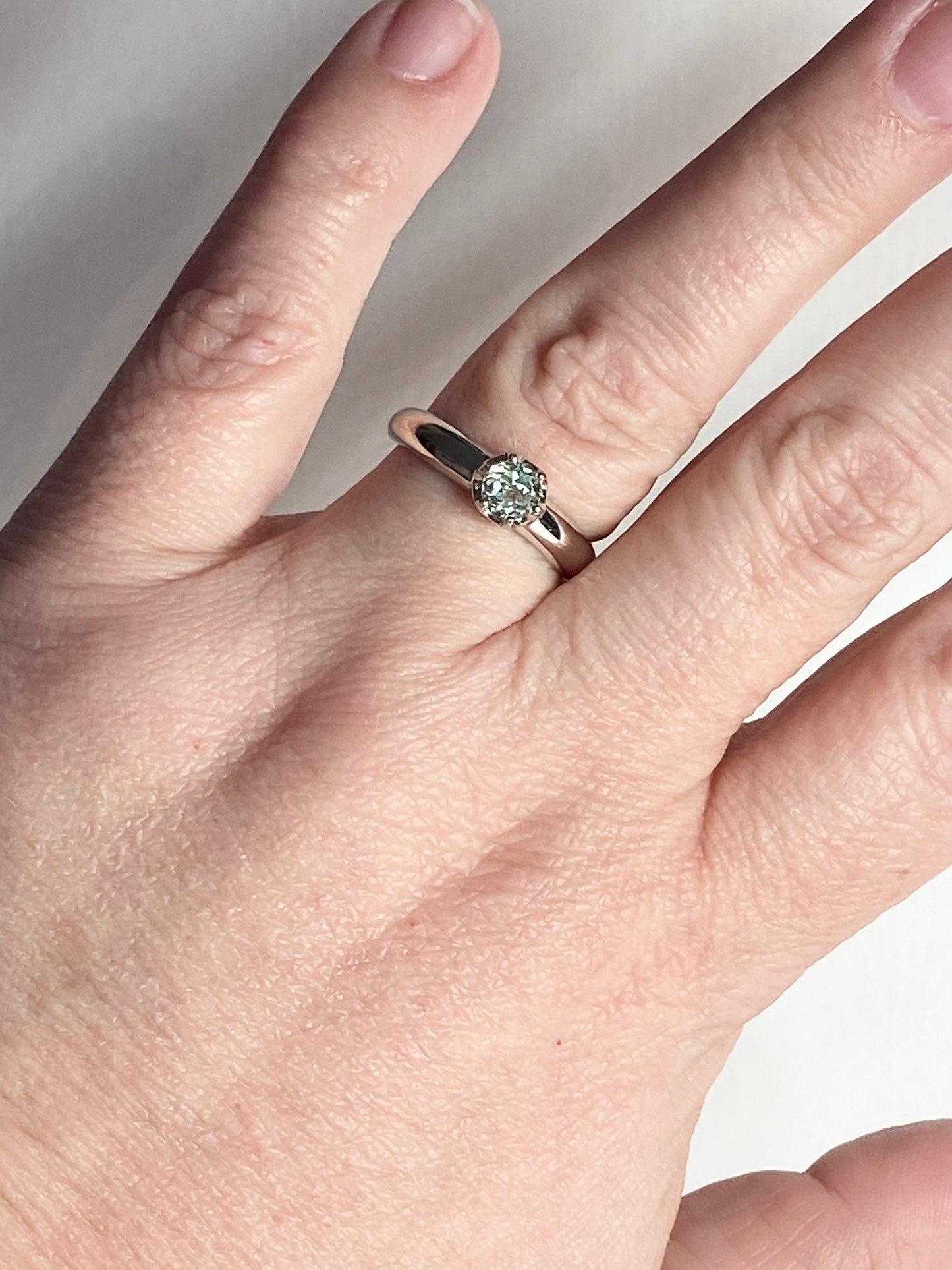 Sterling silver ring with a color-changing chrysoberyl solitaire stone.