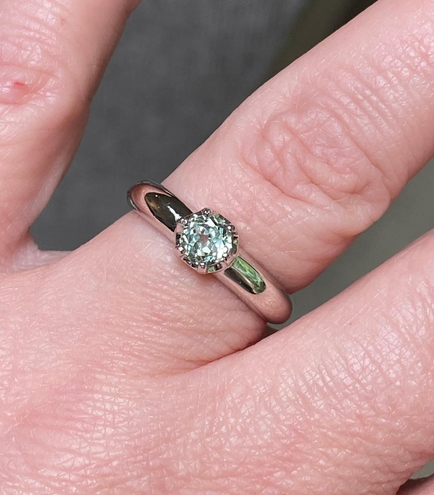 Sterling silver ring with a color-changing chrysoberyl solitaire.