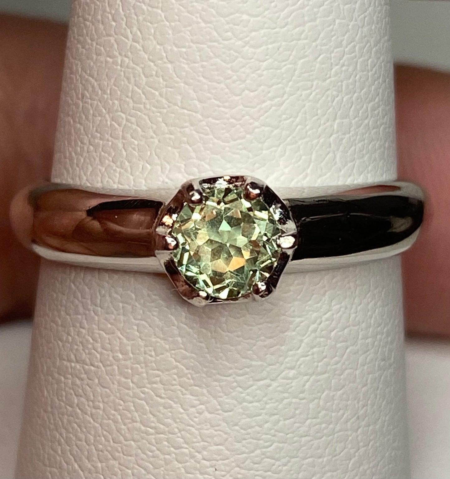 Sterling silver ring with a color-changing chrysoberyl gemstone.