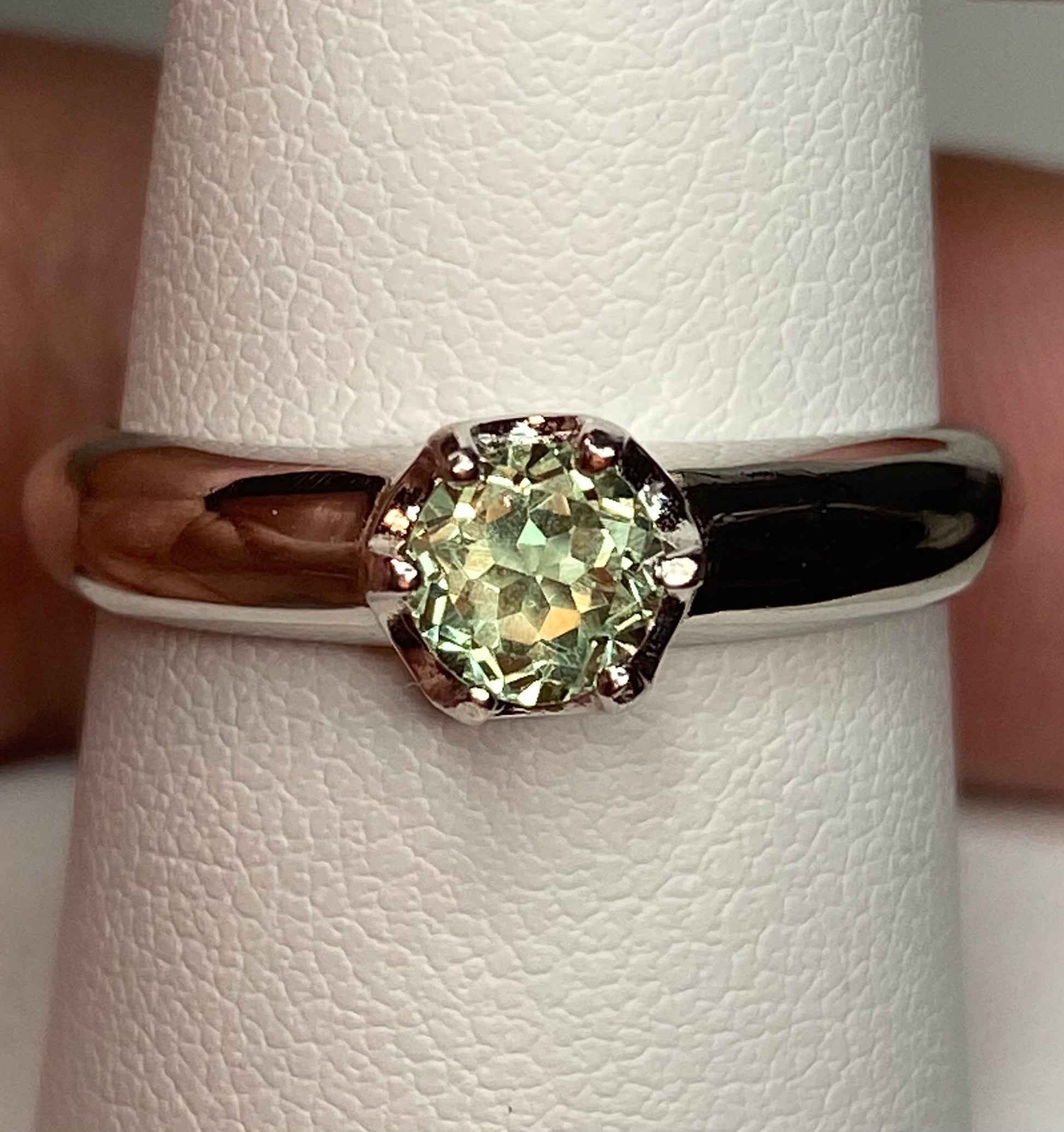 Sterling silver ring with a color-changing chrysoberyl gemstone.