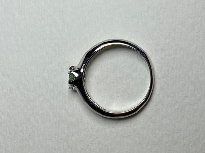 Sterling silver ring with a color-changing chrysoberyl solitaire.