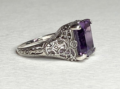 Sterling silver Art Deco ring with a rectangular purple color-change sapphire.