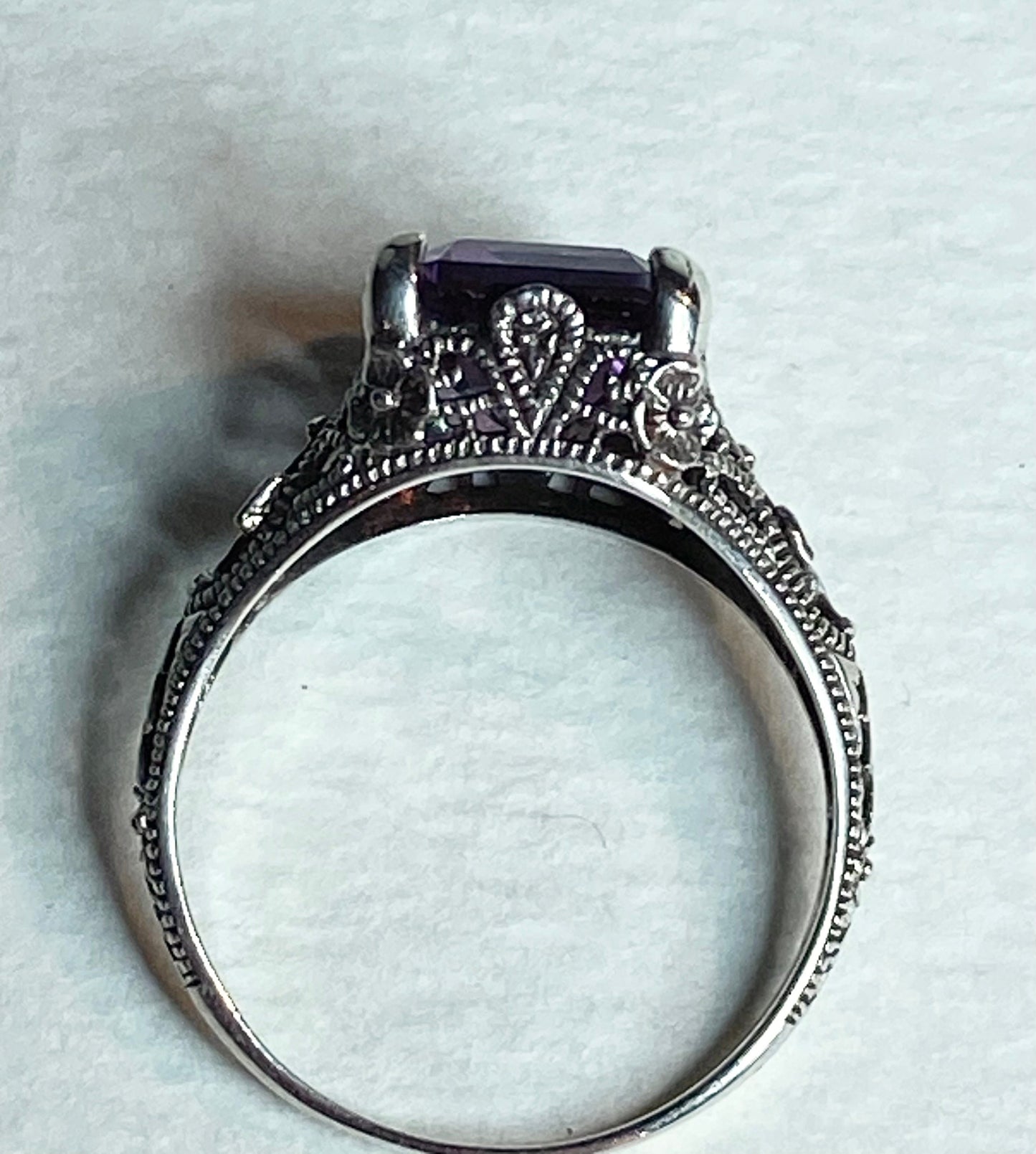 Art Deco sterling silver ring with a color-changing synthetic sapphire.