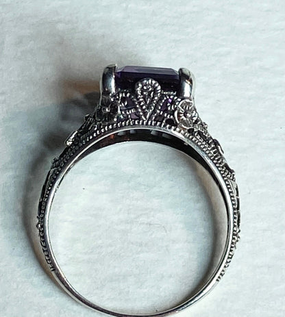 Art Deco sterling silver ring with a color-changing synthetic sapphire.