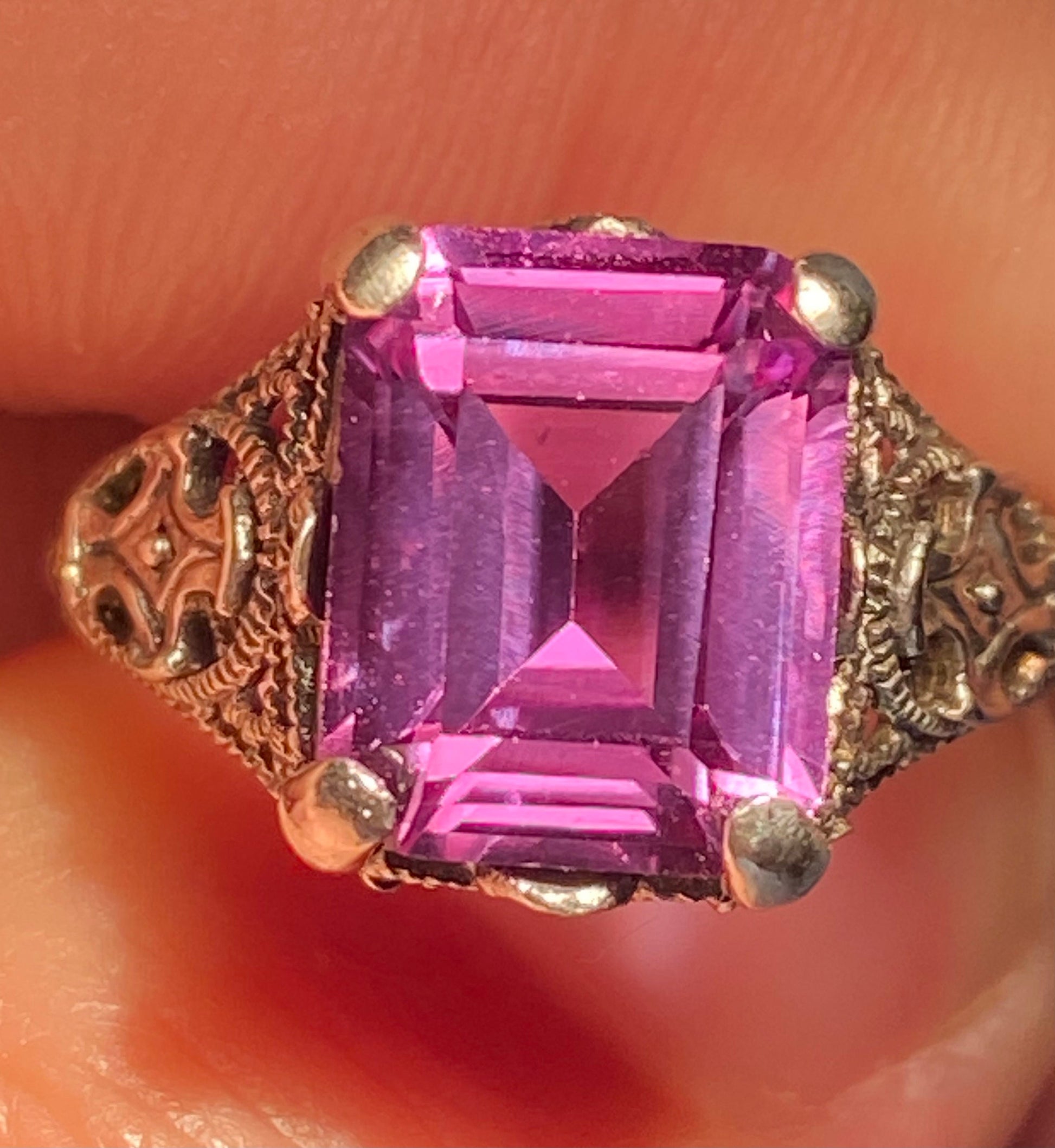 Art Deco sterling silver ring with a magenta color-change sapphire.