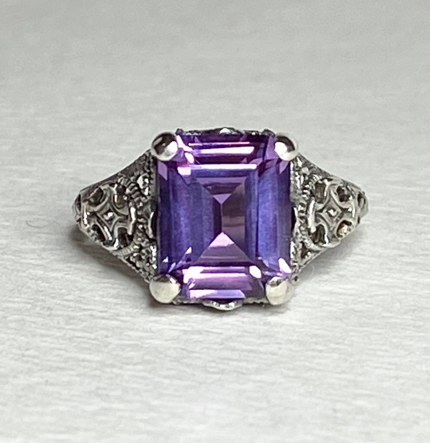 Art Deco sterling silver ring with a rectangular color-change sapphire.