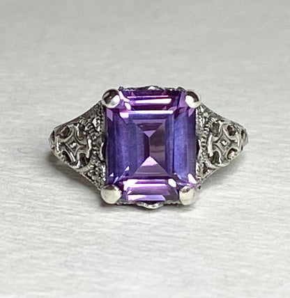 Art Deco sterling silver ring with a rectangular color-change sapphire.