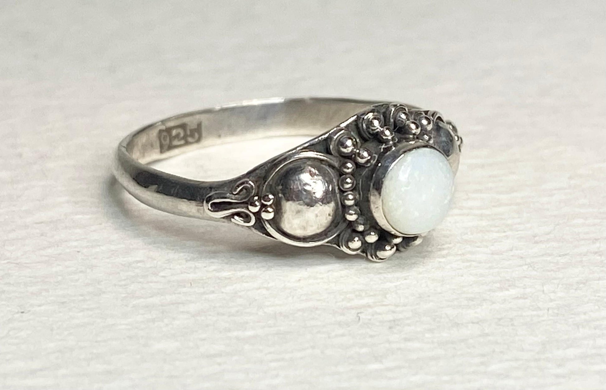 Handmade sterling silver ring with Australian opal, size 7.