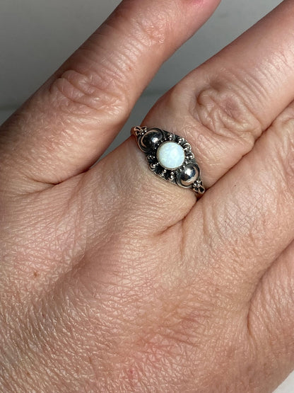 Handmade sterling silver ring with a white Australian opal.