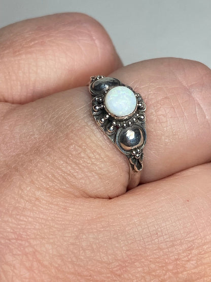 Handmade sterling silver ring with a white Australian opal.