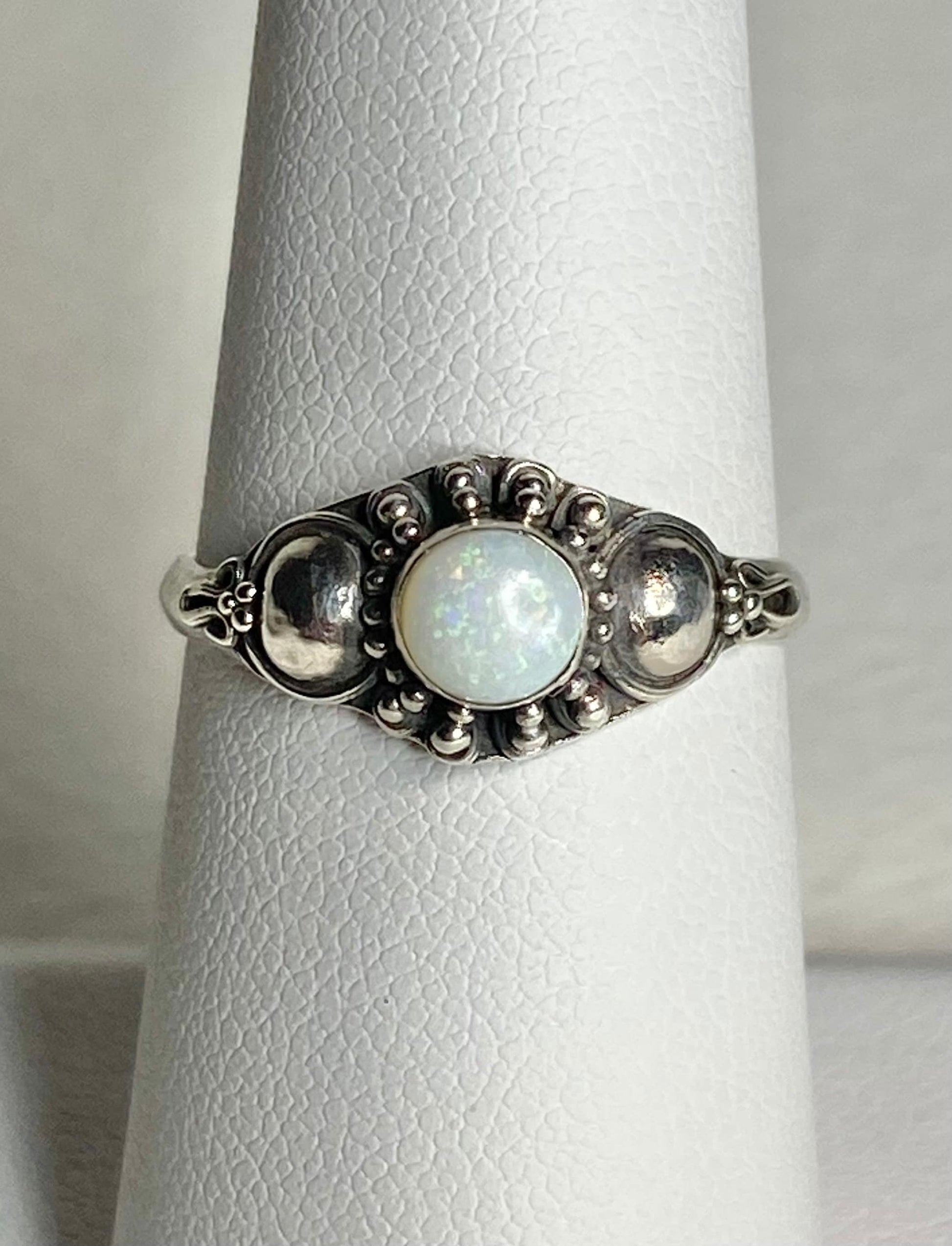 Handmade sterling silver ring with a round Australian opal.