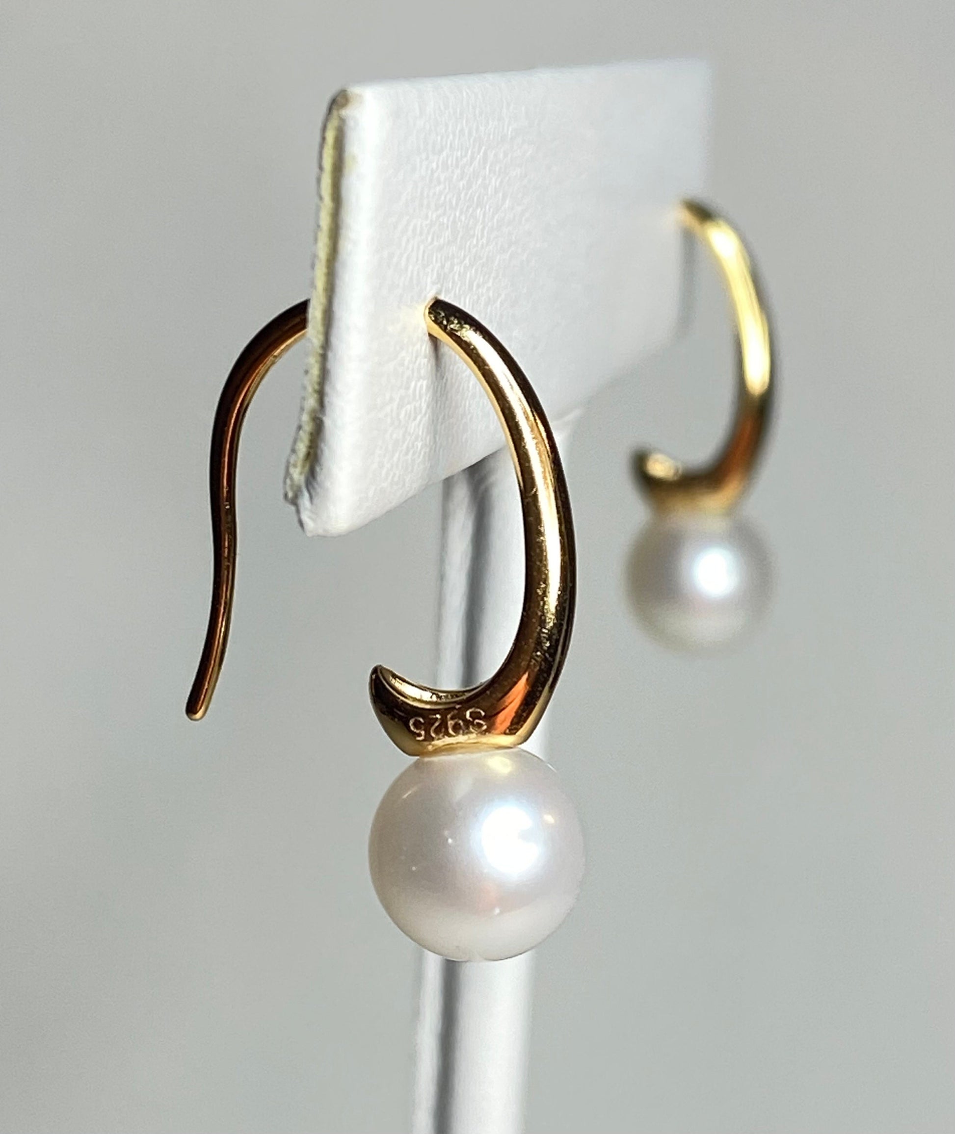 Gold vermeil drop earrings with cultured pearls.