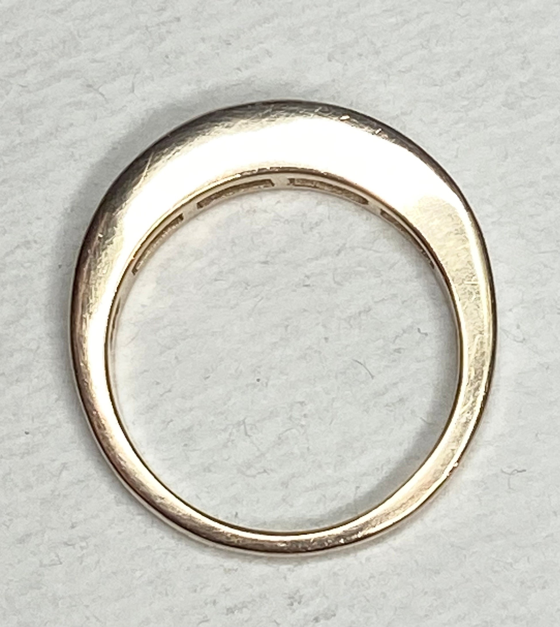 14k yellow gold anniversary band ring with princess cut diamonds.