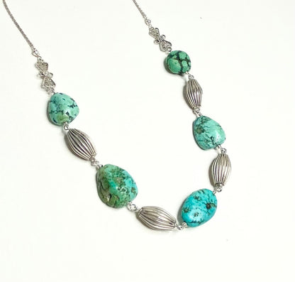 Turquoise and silver beaded necklace choker.
