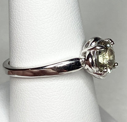 Sterling silver solitaire ring with a color-shifting Oregon Sunstone.