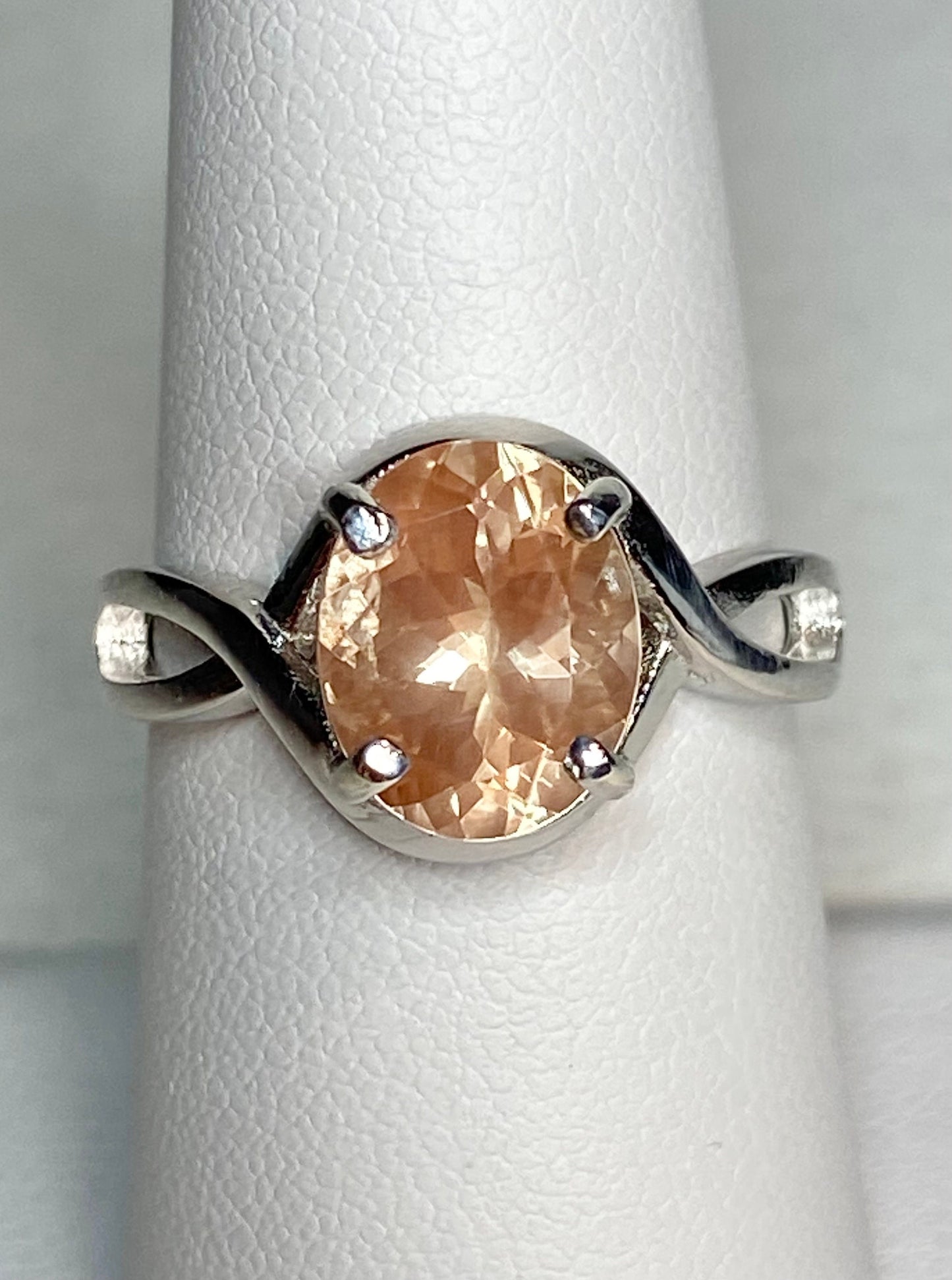 Sterling silver ring with an 8x10mm oval peach Oregon sunstone.