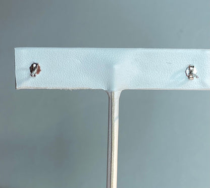 Genuine 6.5mm cultured pearl halves in sterling silver bezel stud earrings.