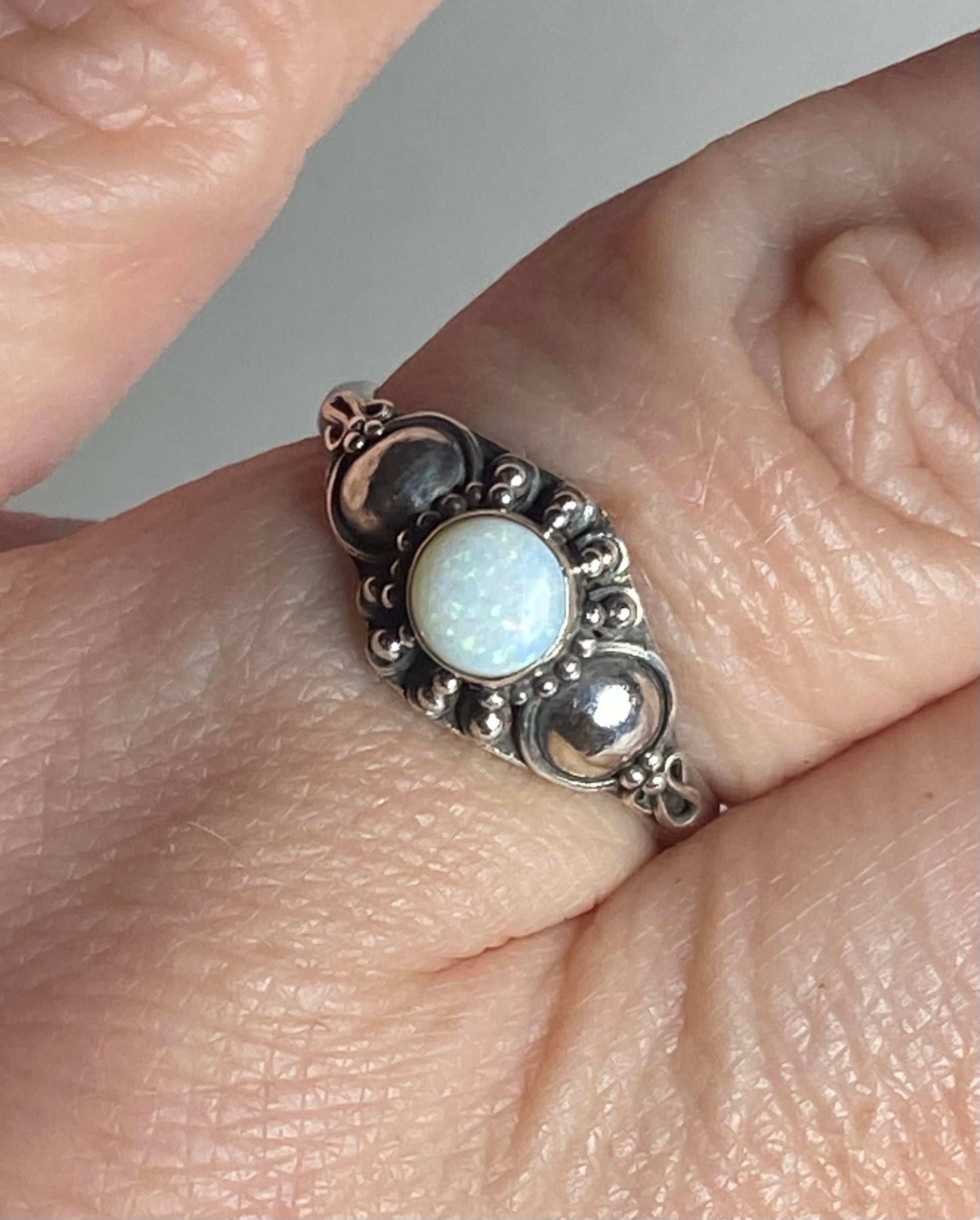 Handmade sterling silver ring with a white Australian opal.